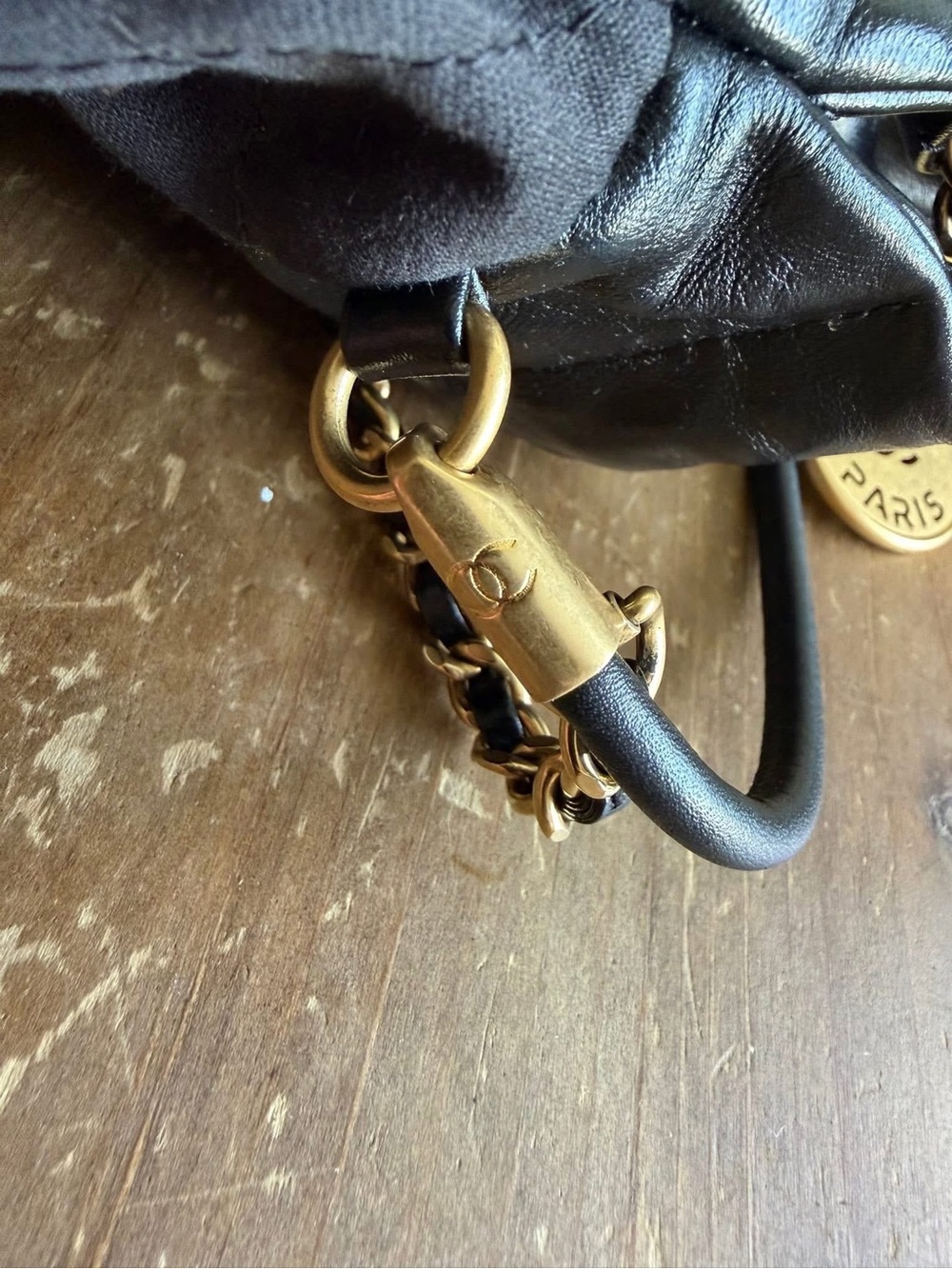 CHANEL Black Quilted Leather Mini Drawstring Bag with Gold Hardware - Picture 6 of 9